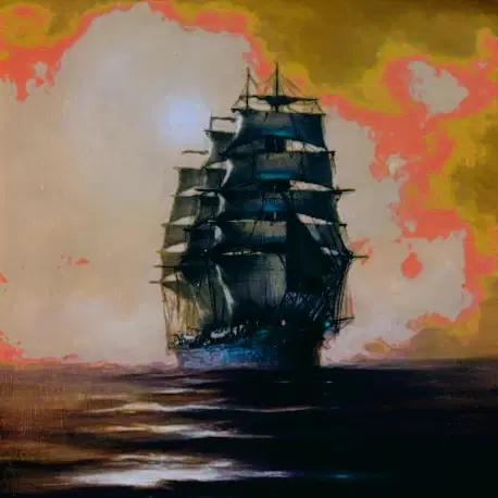 A sailing ship beneath a glowing orange and yellow sky